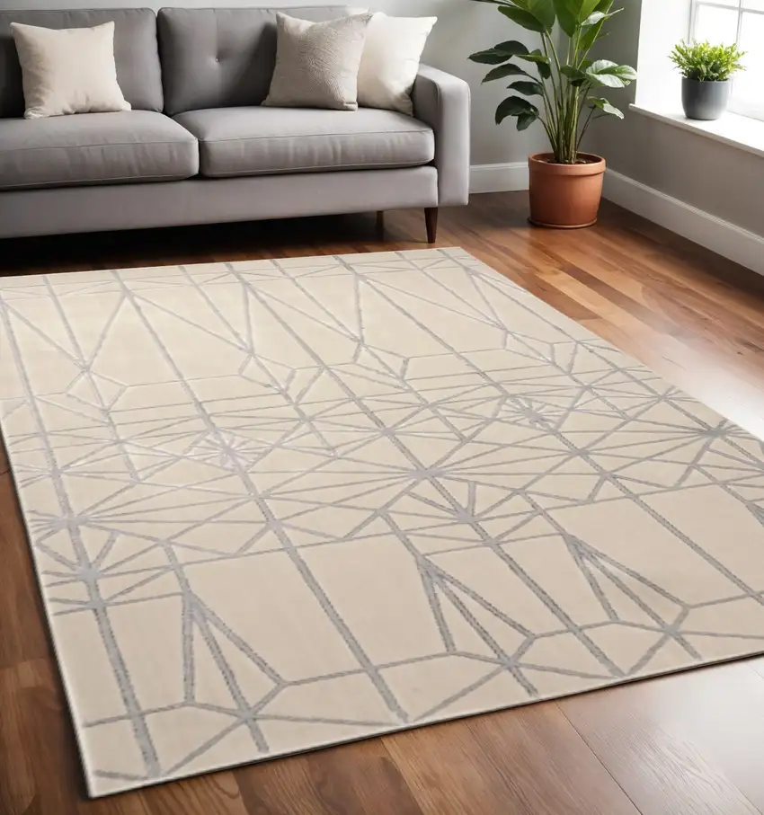 White Silver And Gray Geometric Stain Resistant Area Rug Photo 1