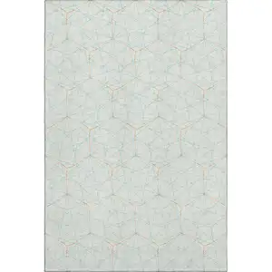 Photo of White Teal And Orange Geometric Washable Area Rug With UV Protection