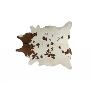 Photo of White and Brown Cowhide  Rug