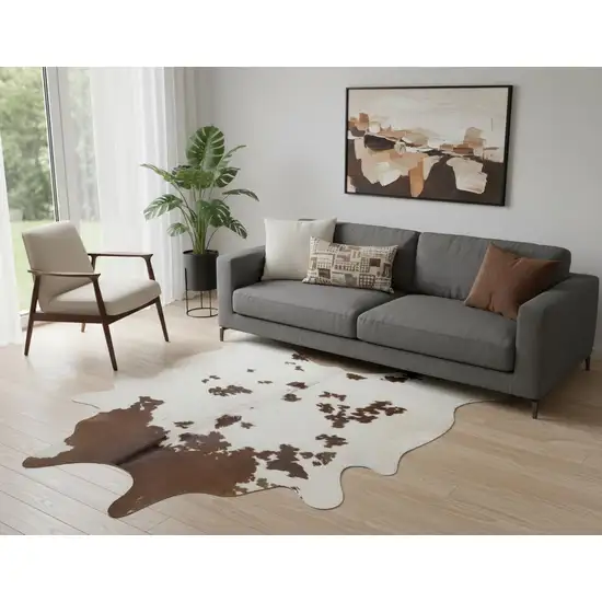 Brown And White Cowhide Area Rug Photo 1