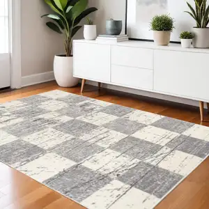 Photo of White and Gray Checkered Area Rug