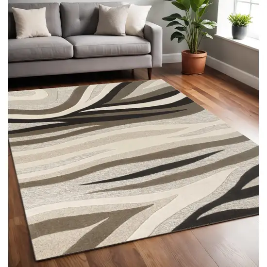 Beige Ivory And Black Wool Abstract Hand Tufted Area Rug Photo 1