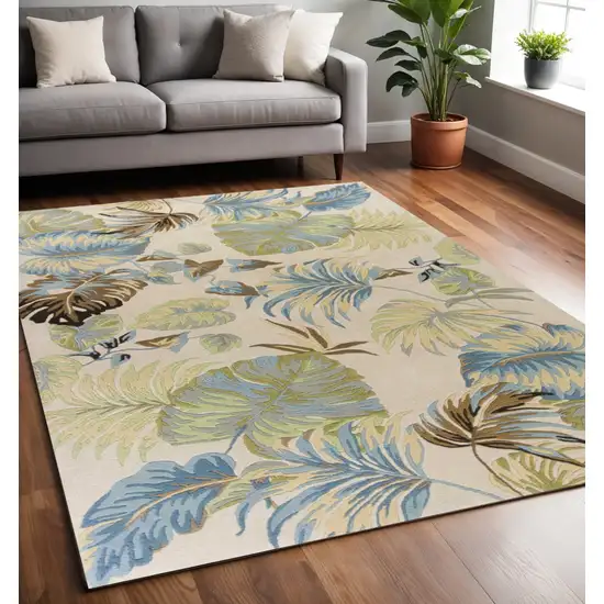 Ivory And Blue Wool Botanical Leaves Hand Tufted Area Rug Photo 1