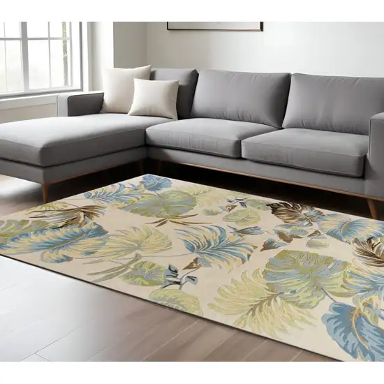 Ivory And Blue Wool Botanical Leaves Hand Tufted Area Rug Photo 1