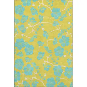 Photo of Yellow And Aqua Floral Washable Area Rug With UV Protection