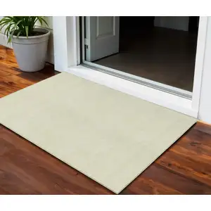 Photo of Yellow And Beige Geometric Washable Indoor Outdoor Area Rug