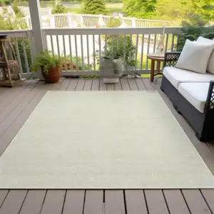 Photo of Yellow And Beige Geometric Washable Indoor Outdoor Area Rug