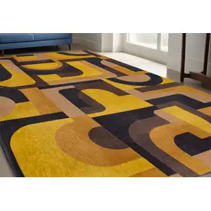 Photo of Yellow And Black Geometric Washable Area Rug