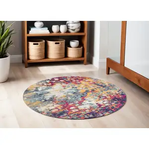 Photo of Yellow And Blue Abstract Round Rug