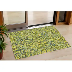 Photo of Yellow And Blue Abstract Washable Indoor Outdoor Area Rug
