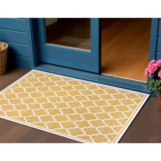 Yellow And Cream Geometric Indoor Outdoor Area Rug Photo 1