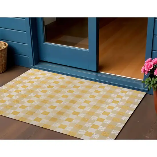 Yellow And Cream Geometric Indoor Outdoor Area Rug Photo 1