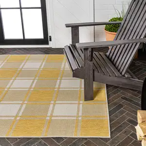 Photo of Yellow And Cream Gingham Indoor Outdoor Area Rug