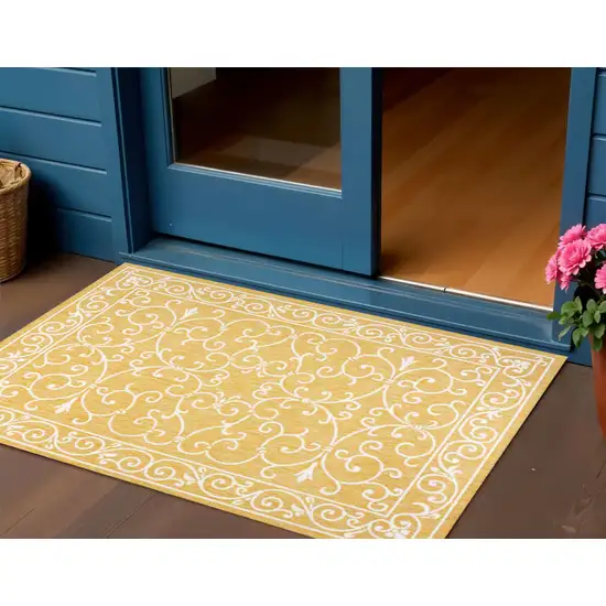 Yellow And Cream Medallion Indoor Outdoor Area Rug Photo 1