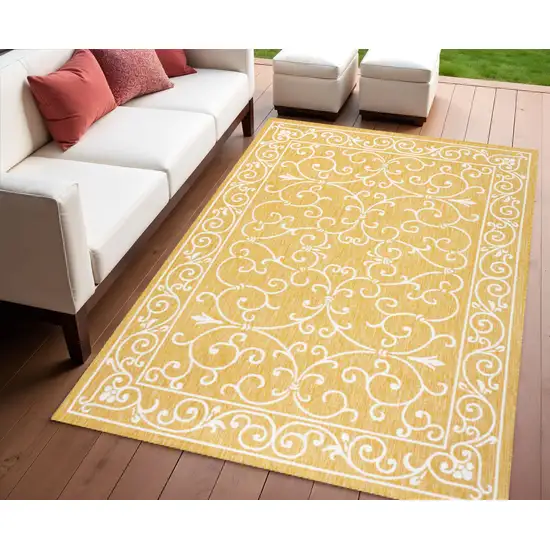 Yellow And Cream Medallion Indoor Outdoor Area Rug Photo 1