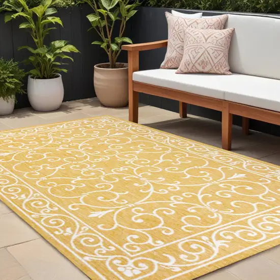Yellow And Cream Medallion Indoor Outdoor Area Rug Photo 1