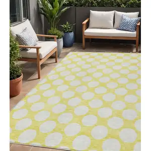 Photo of Yellow And Gray Polka Dot Washable Indoor Outdoor Area Rug