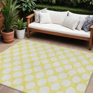 Photo of Yellow And Gray Polka Dot Washable Indoor Outdoor Area Rug