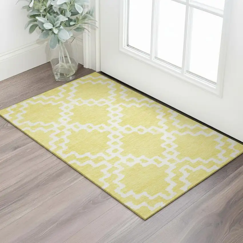 Yellow And Ivory Abstract Geometric Washable Area Rug With UV Protection Photo 1