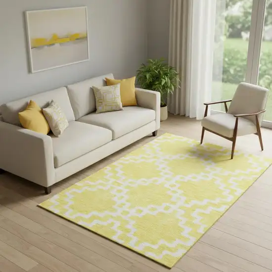 Yellow And Ivory Abstract Geometric Washable Area Rug With UV Protection Photo 1