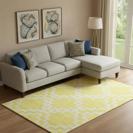 Yellow And Ivory Abstract Geometric Washable Area Rug With UV Protection Photo 1