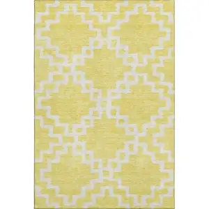 Photo of Yellow And Ivory Abstract Geometric Washable Area Rug With UV Protection