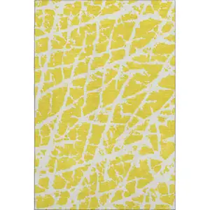 Photo of Yellow And Ivory Abstract Washable Area Rug With UV Protection
