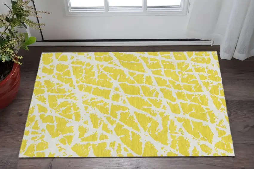 Yellow And Ivory Abstract Washable Area Rug With UV Protection Photo 2