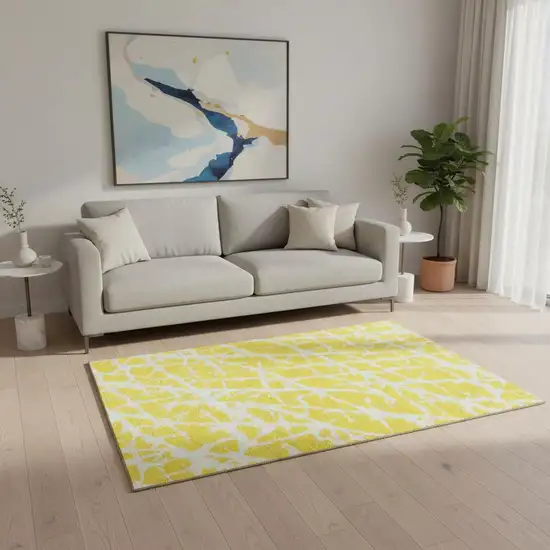 Yellow And Ivory Abstract Washable Area Rug With UV Protection Photo 1