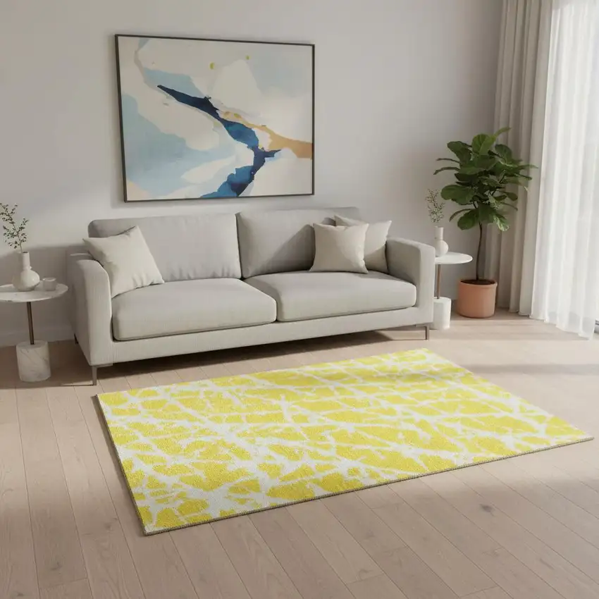 Yellow And Ivory Abstract Washable Area Rug With UV Protection Photo 1