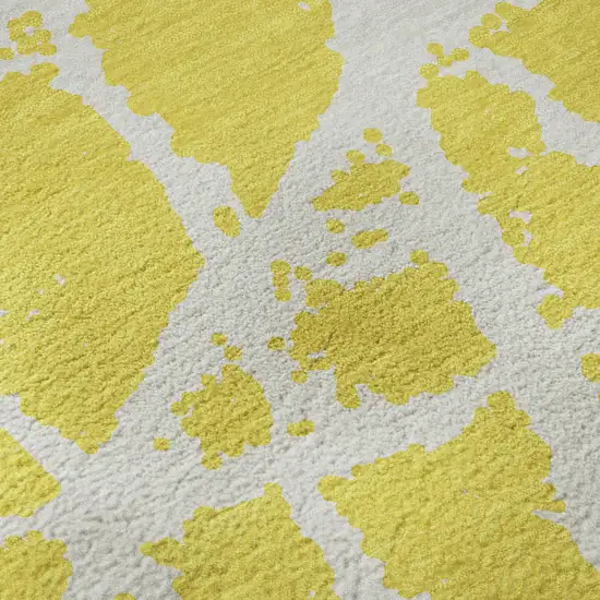 Yellow And Ivory Abstract Washable Area Rug With UV Protection Photo 1