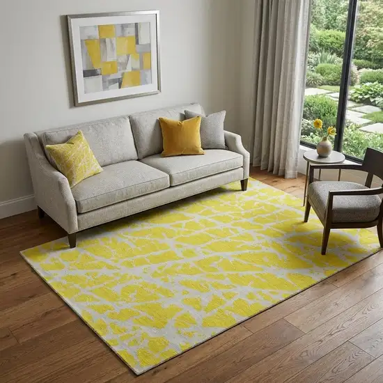 Yellow And Ivory Abstract Washable Area Rug With UV Protection Photo 1