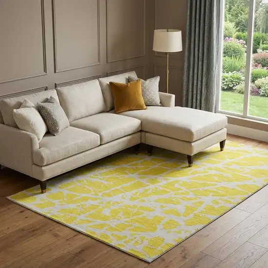 Yellow And Ivory Abstract Washable Area Rug With UV Protection Photo 1