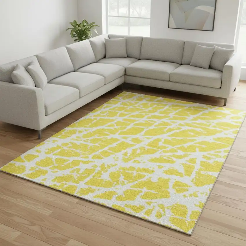 Yellow And Ivory Abstract Washable Area Rug With UV Protection Photo 1