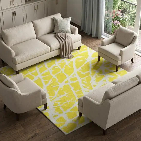 Yellow And Ivory Abstract Washable Area Rug With UV Protection Photo 1