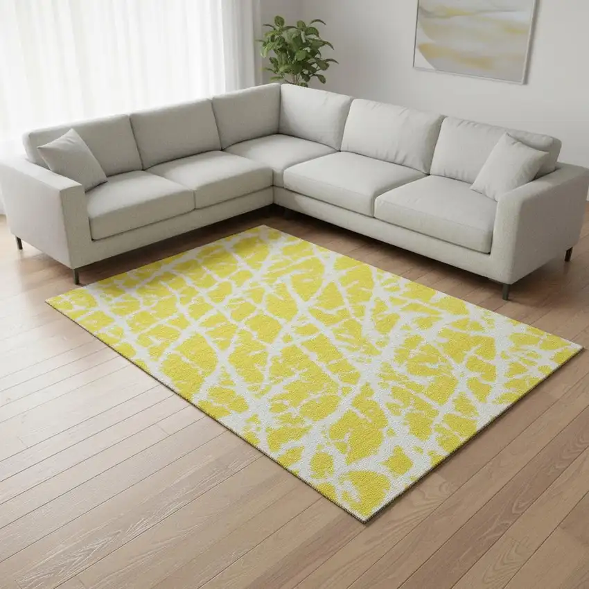 Yellow And Ivory Abstract Washable Area Rug With UV Protection Photo 1