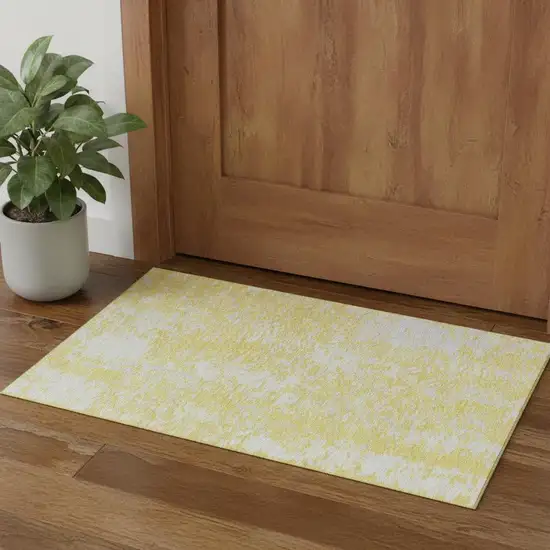 Yellow And Ivory Abstract Washable Area Rug With UV Protection Photo 1