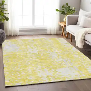 Photo of Yellow And Ivory Abstract Washable Area Rug With UV Protection