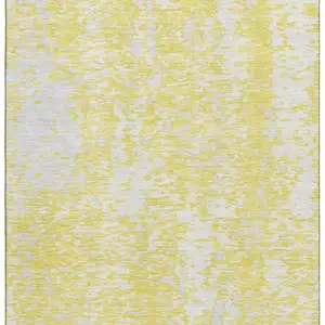Photo of Yellow And Ivory Abstract Washable Area Rug With UV Protection