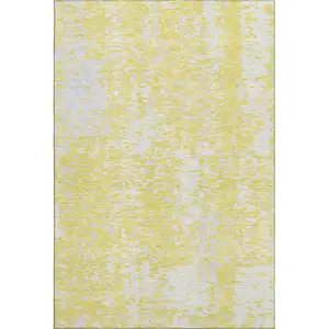 Photo of Yellow And Ivory Abstract Washable Area Rug With UV Protection