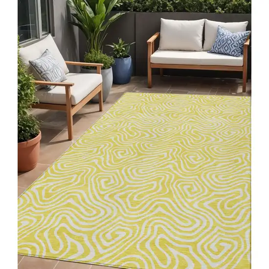 Yellow And Ivory Abstract Washable Indoor Outdoor Area Rug Photo 1