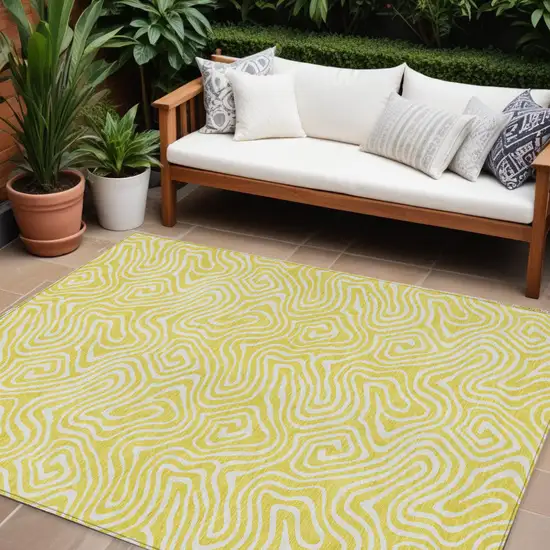 Yellow And Ivory Abstract Washable Indoor Outdoor Area Rug Photo 1