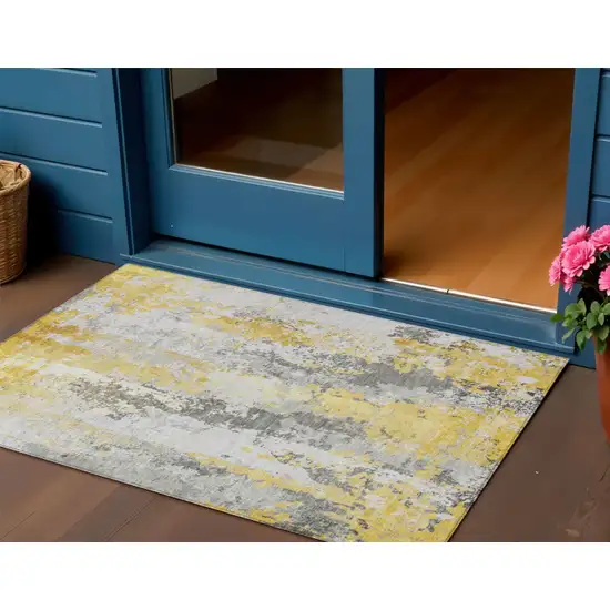Yellow And Ivory Abstract Washable Indoor Outdoor Area Rug Photo 2