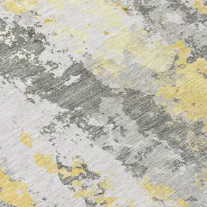 Photo of Yellow And Ivory Abstract Washable Indoor Outdoor Area Rug