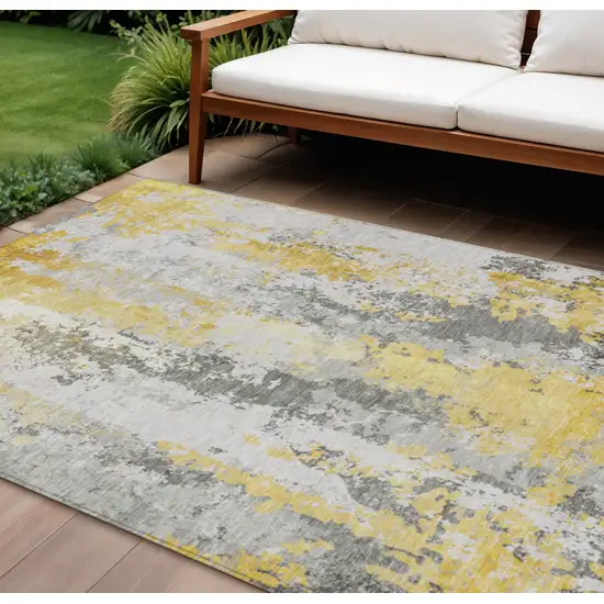 Yellow And Ivory Abstract Washable Indoor Outdoor Area Rug Photo 2