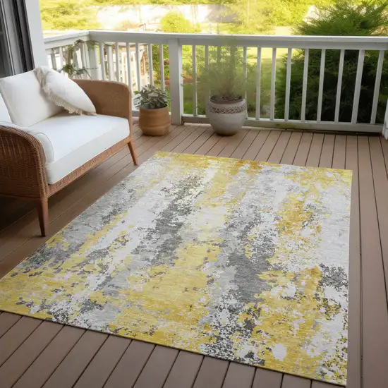 Yellow And Ivory Abstract Washable Indoor Outdoor Area Rug Photo 4
