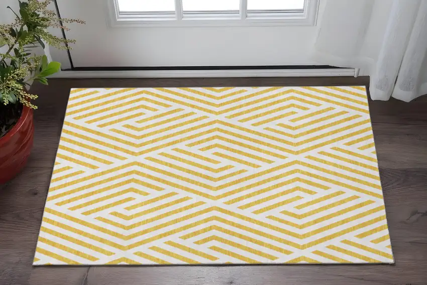 Yellow And Ivory Geometric Washable Area Rug With UV Protection Photo 2