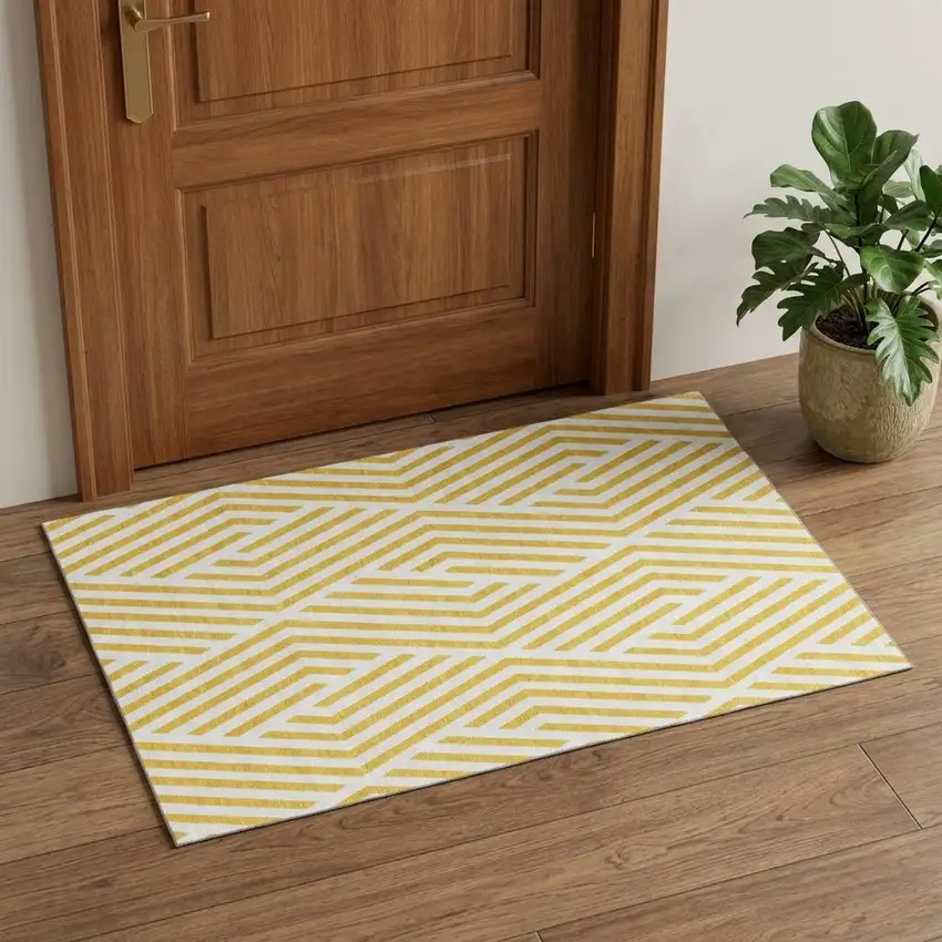Yellow And Ivory Geometric Washable Area Rug With UV Protection Photo 1