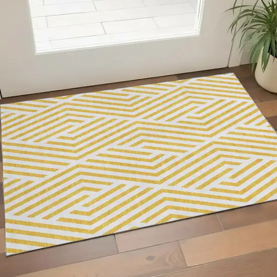 Yellow And Ivory Geometric Washable Area Rug With UV Protection Photo 1