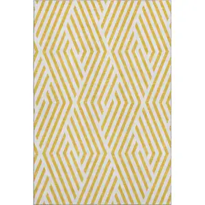 Photo of Yellow And Ivory Geometric Washable Area Rug With UV Protection